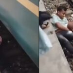 πατέρας ασπίδα βρέφος στις ράγες Bhairab