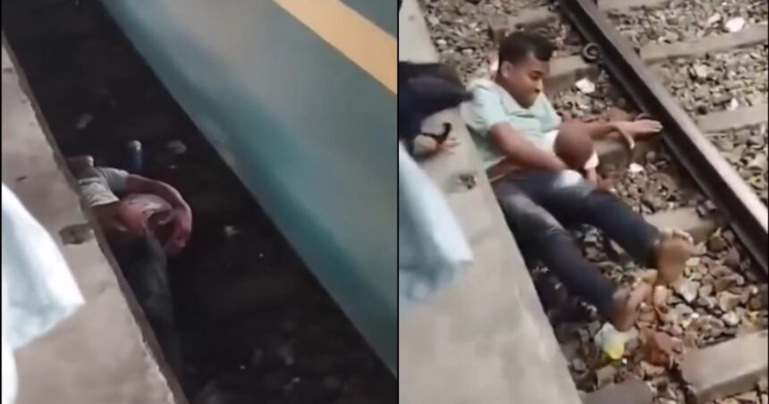 πατέρας ασπίδα βρέφος στις ράγες Bhairab