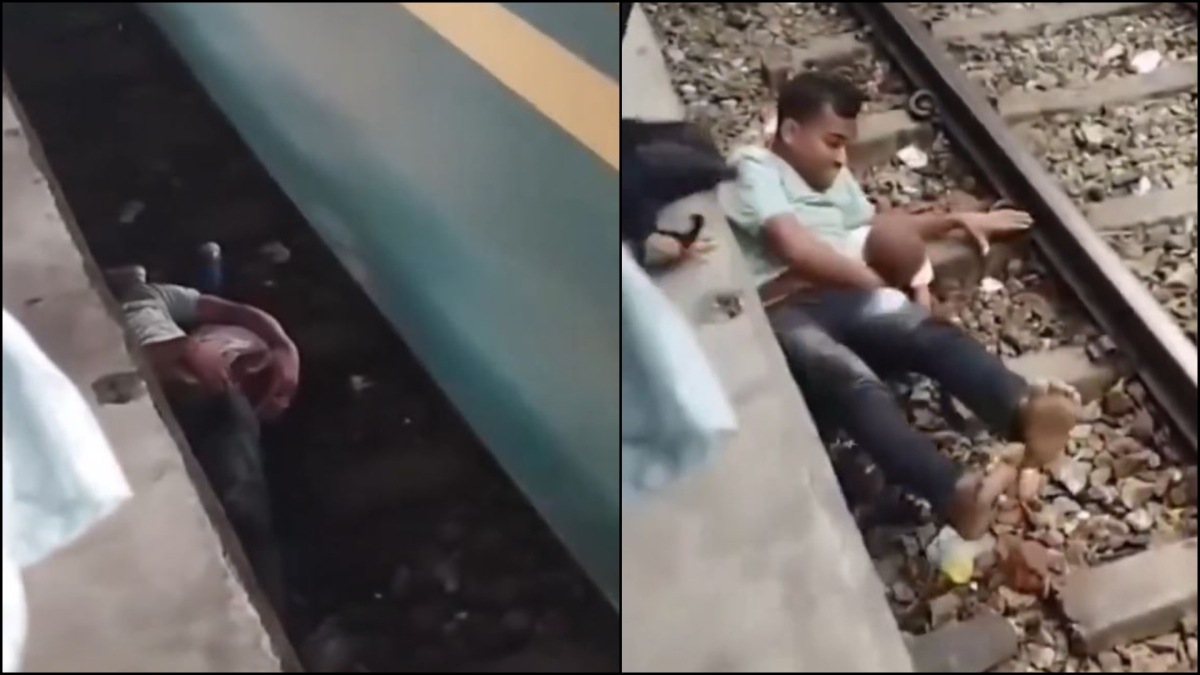 πατέρας ασπίδα βρέφος στις ράγες Bhairab